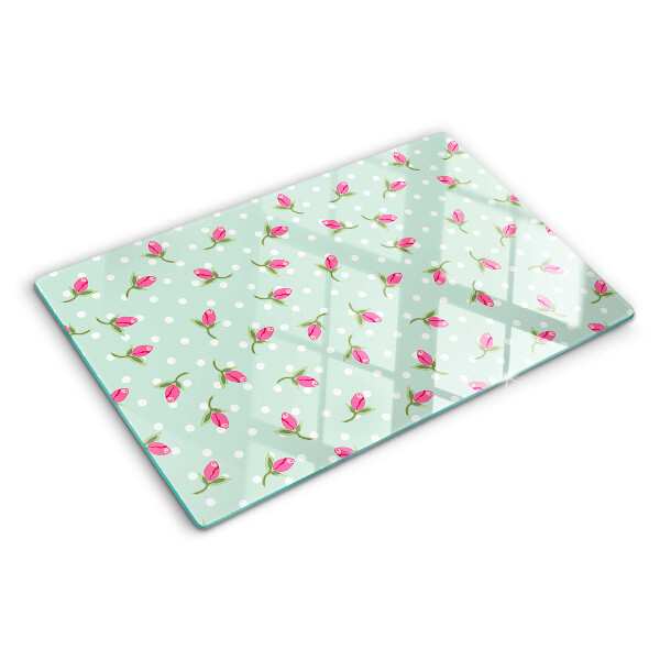 Snijplanken van glas Roze tulpen op een groene achtergrond