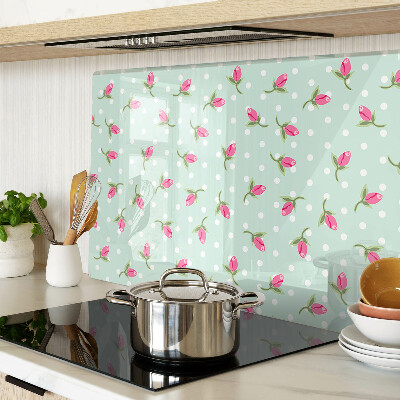 Snijplanken van glas Roze tulpen op een groene achtergrond