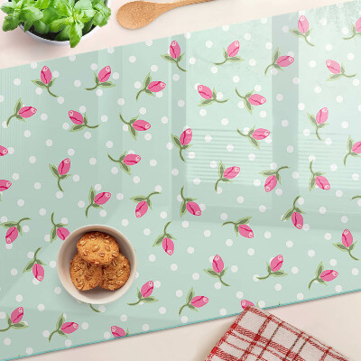 Snijplanken van glas Roze tulpen op een groene achtergrond