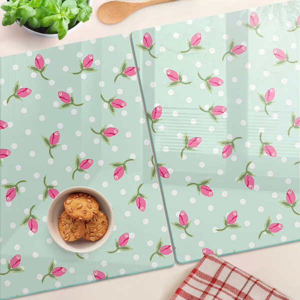 Snijplanken van glas Roze tulpen op een groene achtergrond