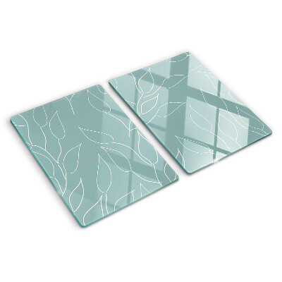 Glazen snijplanken Bladeren op de achtergrond