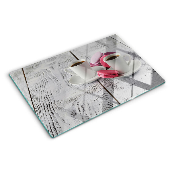 Snijplanken glas Koffie en macarons op een houten achtergrond.