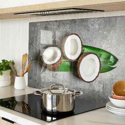 Glazen snijplanken Kokosnoot op een betonnen achtergrond