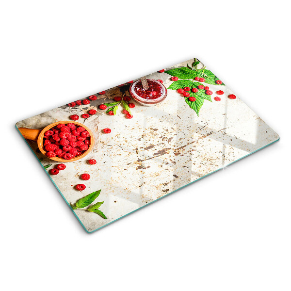 Snijplanken van glas Frambozen en bladeren