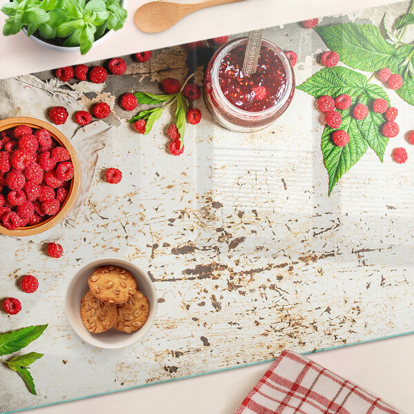 Snijplanken van glas Frambozen en bladeren