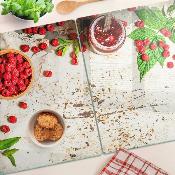 Snijplanken van glas Frambozen en bladeren