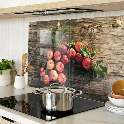 Snijplanken van glas Appels op een houten achtergrond