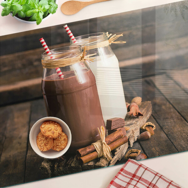 Glazen snijplanken Potten met drankjes op een houten achtergrond
