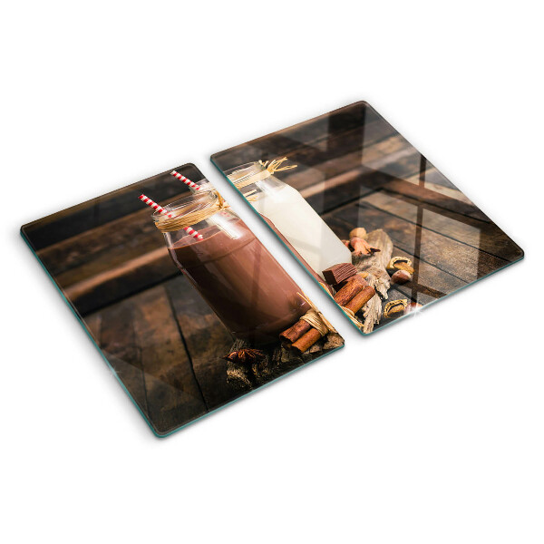 Glazen snijplanken Potten met drankjes op een houten achtergrond