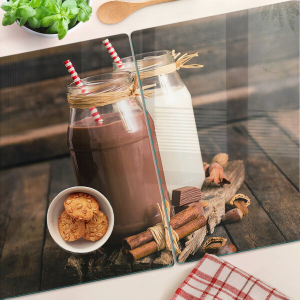 Glazen snijplanken Potten met drankjes op een houten achtergrond