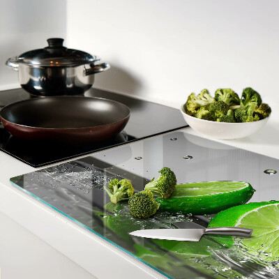 Snijplanken van glas Citroenen in water