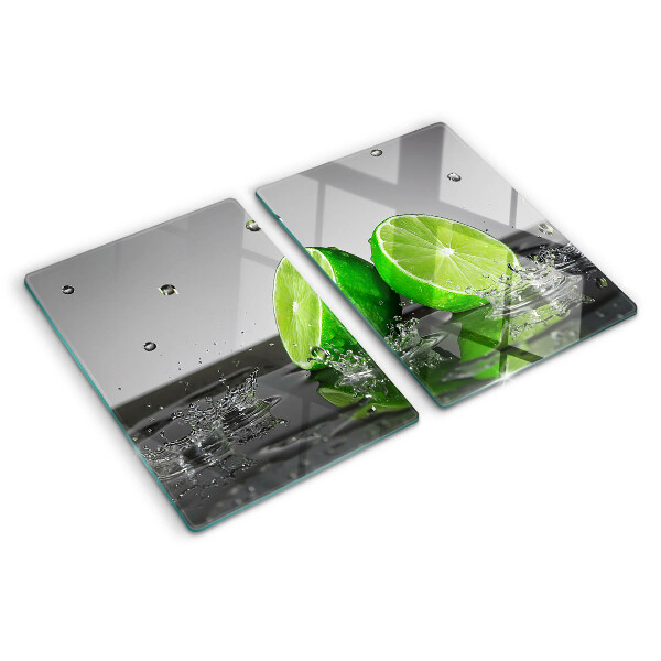 Snijplanken van glas Citroenen in water