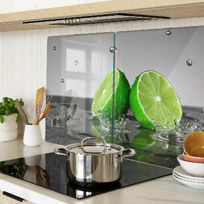 Snijplanken van glas Citroenen in water