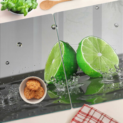 Snijplanken van glas Citroenen in water