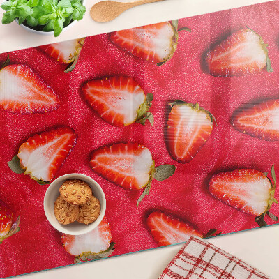 Snijplanken van glas Aardbeien op een roze achtergrond