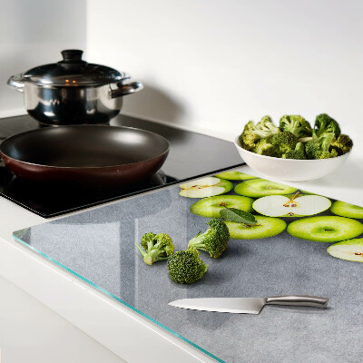 Snijplanken glas Groene appels op een grijze achtergrond