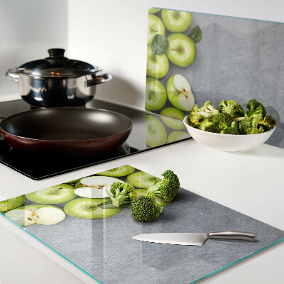 Snijplanken glas Groene appels op een grijze achtergrond