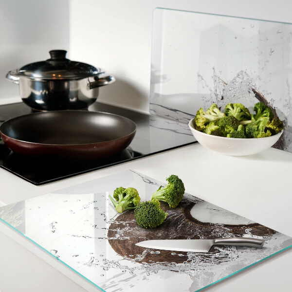 Snijplanken glas Kokosnoot met water en een scheutje