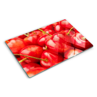 Snijplanken glas Kersen op een rode achtergrond