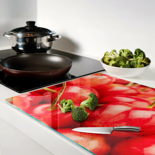 Snijplanken glas Kersen op een rode achtergrond