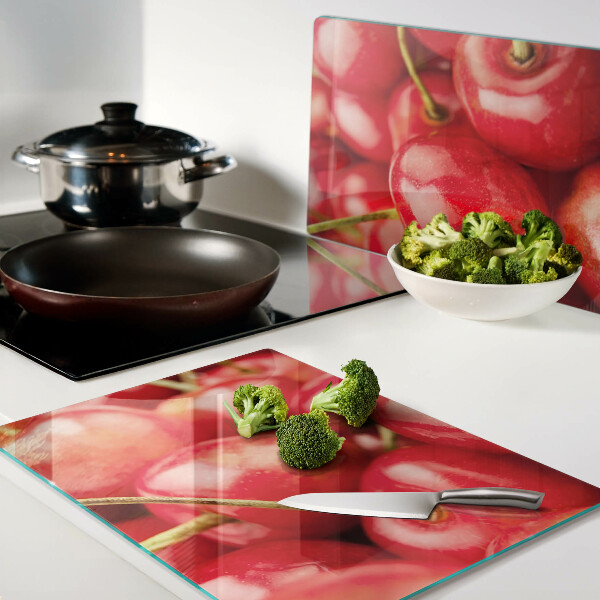 Snijplanken glas Kersen op een rode achtergrond