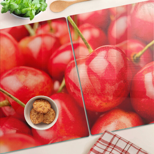 Snijplanken glas Kersen op een rode achtergrond