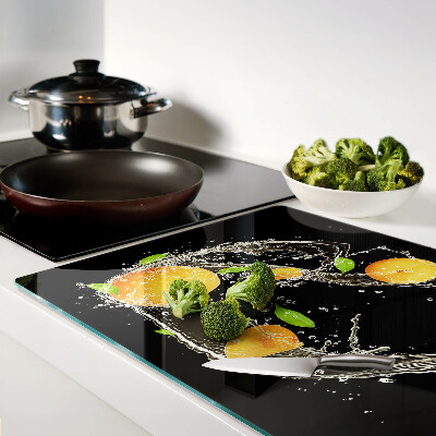 Snijplanken van glas Citrusvruchten in water