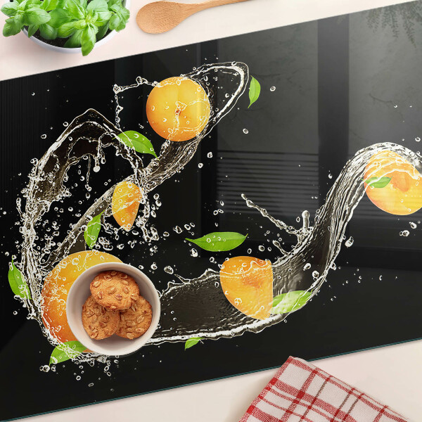 Snijplanken van glas Citrusvruchten in water