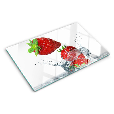 Snijplanken van glas Aardbeien in water