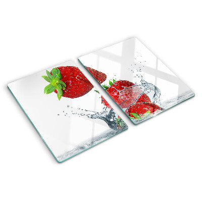 Snijplanken van glas Aardbeien in water