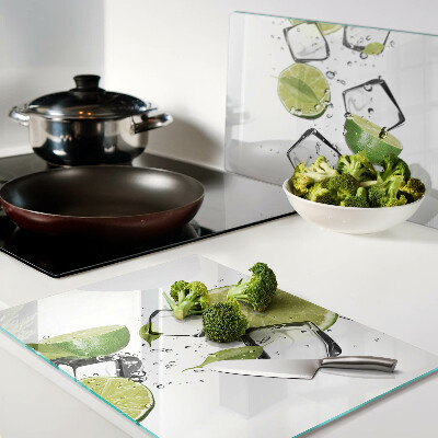 Glazen snijplanken Citroenen met ijs in water