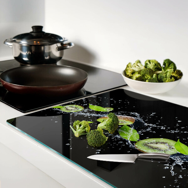 Snijplanken glas Kiwi in water met bladeren