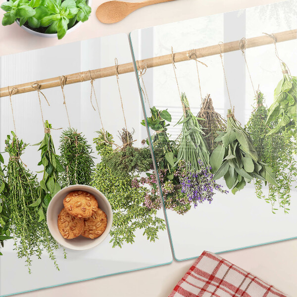 Glazen snijplanken Gedroogde kruiden aan een touwtje