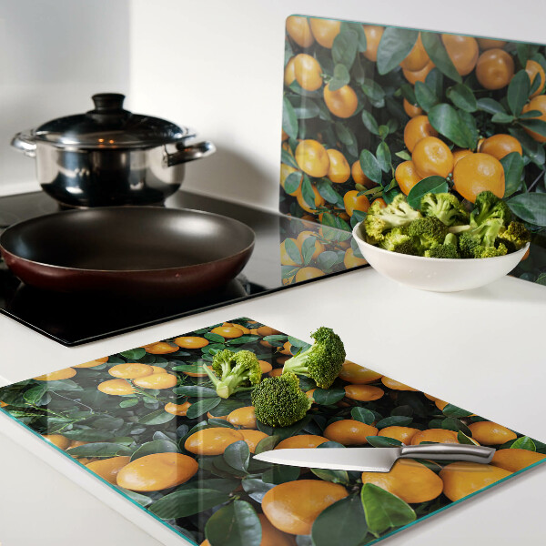 Snijplanken van glas Mandarijnen aan de takken