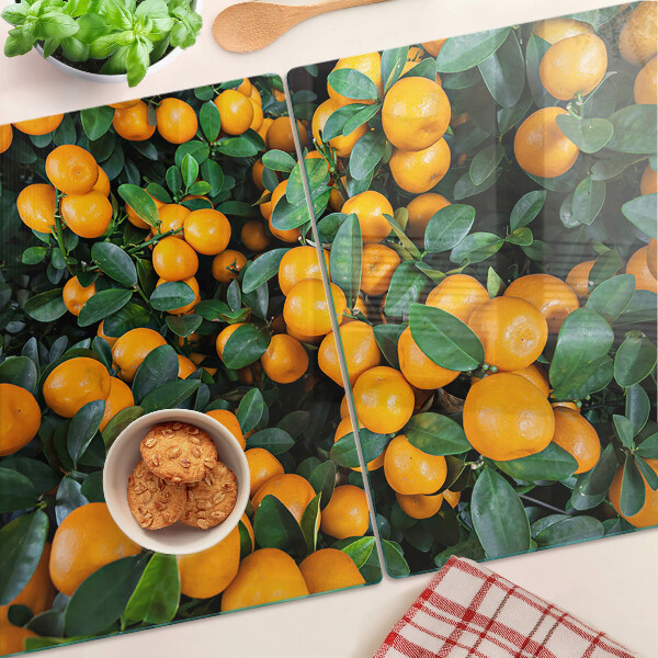 Snijplanken van glas Mandarijnen aan de takken