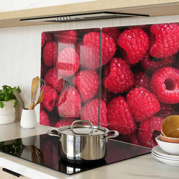 Glazen snijplanken Frambozen op de achtergrond