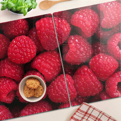 Glazen snijplanken Frambozen op de achtergrond