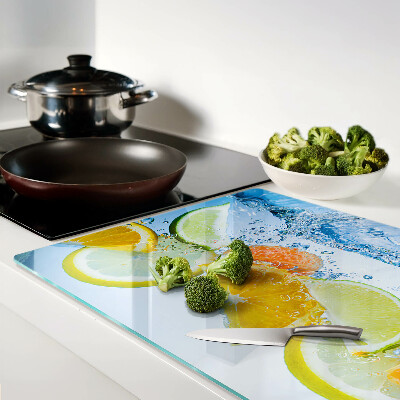 Snijplanken van glas Citrusvruchten in water