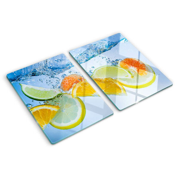 Snijplanken van glas Citrusvruchten in water