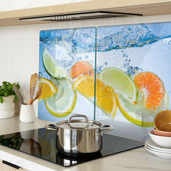 Snijplanken van glas Citrusvruchten in water