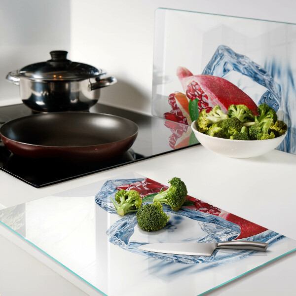 Snijplanken van glas Granaatappel in ijs