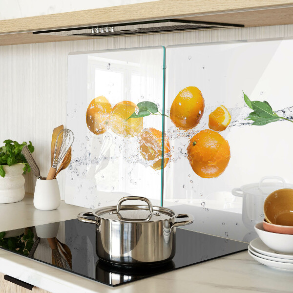 Snijplanken van glas Citrusvruchten met water