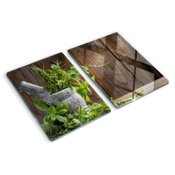 Snijplanken van glas Kruiden in een pot