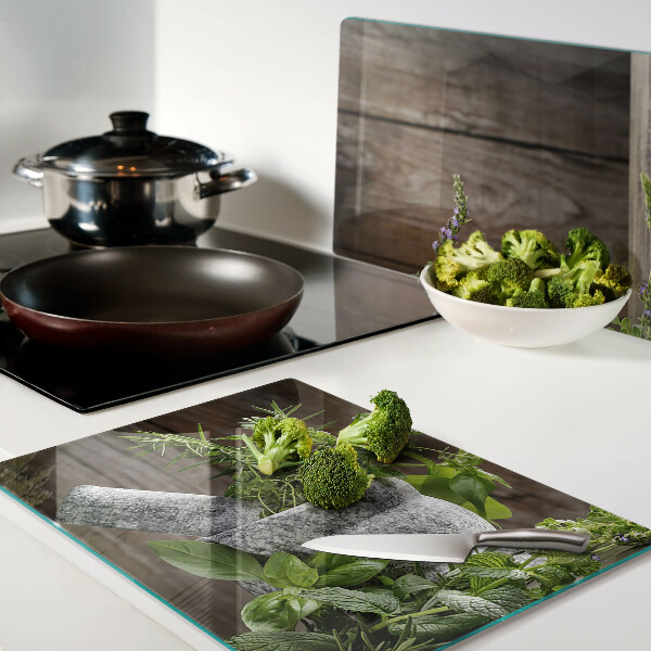 Snijplanken van glas Kruiden in een pot