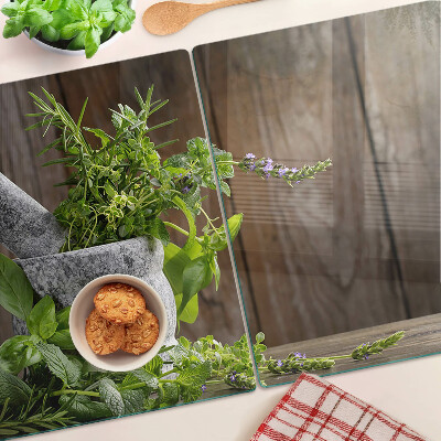 Snijplanken van glas Kruiden in een pot