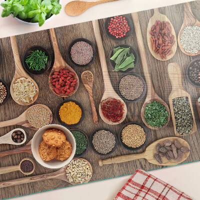 Snijplanken van glas Specerijen en specerijen in lepels