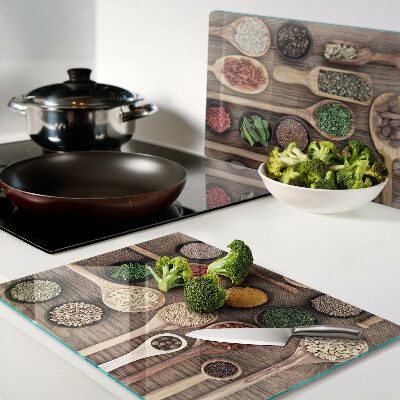 Snijplanken van glas Specerijen en specerijen in lepels