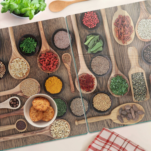 Snijplanken van glas Specerijen en specerijen in lepels