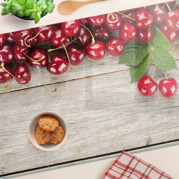 Snijplanken van glas Kersen op een houten achtergrond