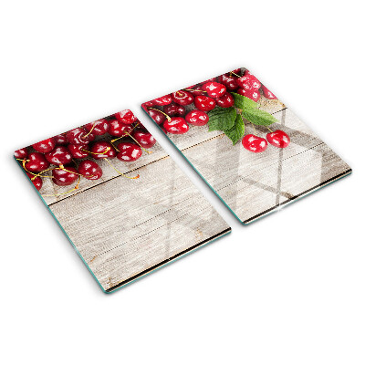 Snijplanken van glas Kersen op een houten achtergrond